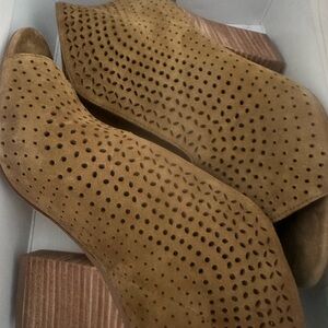 Women's Tan Perforated Suede Shoes. They fit more like a size 7.